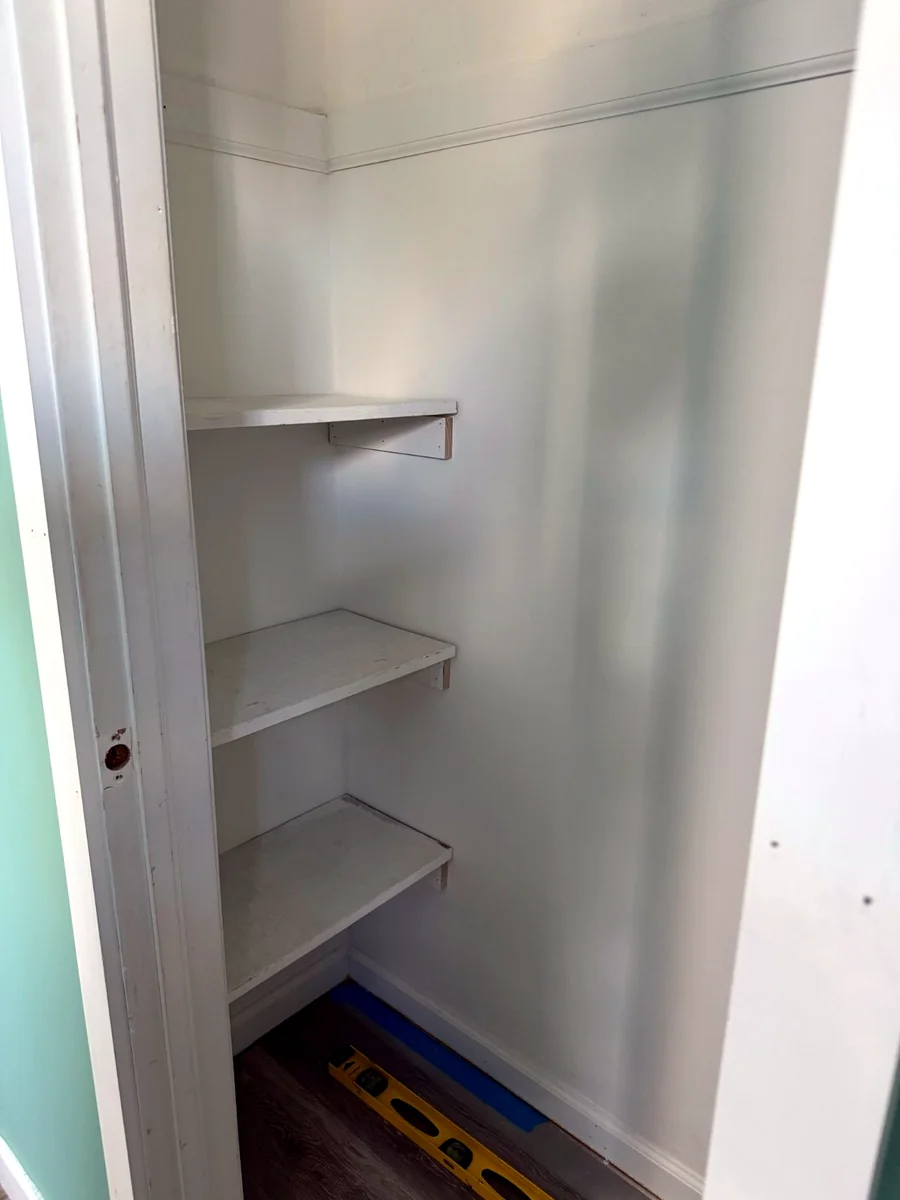 Custom closet shelving installed for small-space storage